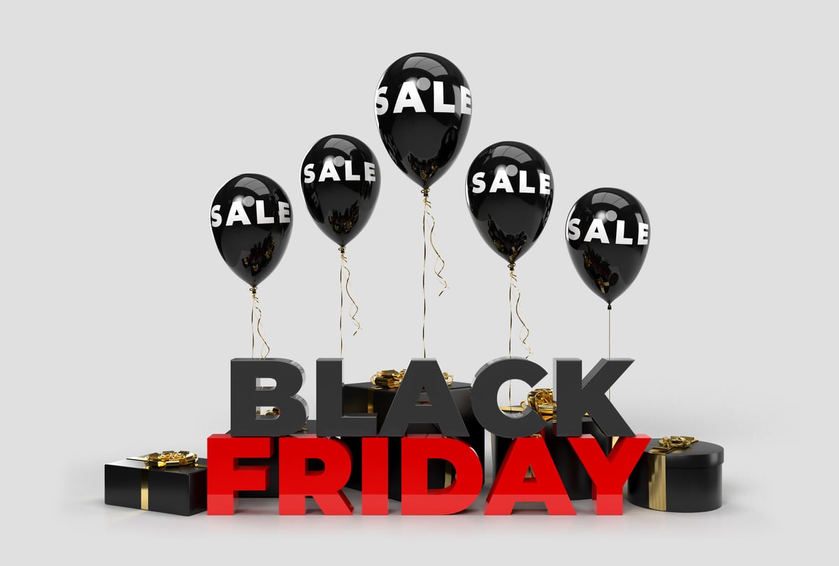 Black Friday with Sale Balloons and Presents on White Background